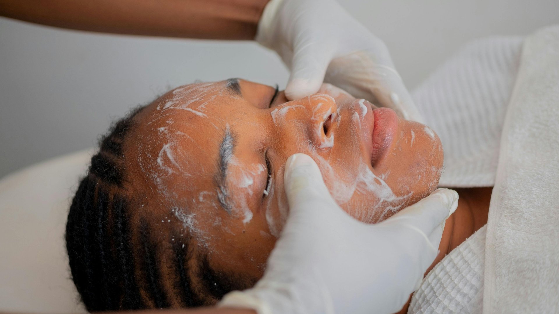 Deep cleanse facial treatment in progress