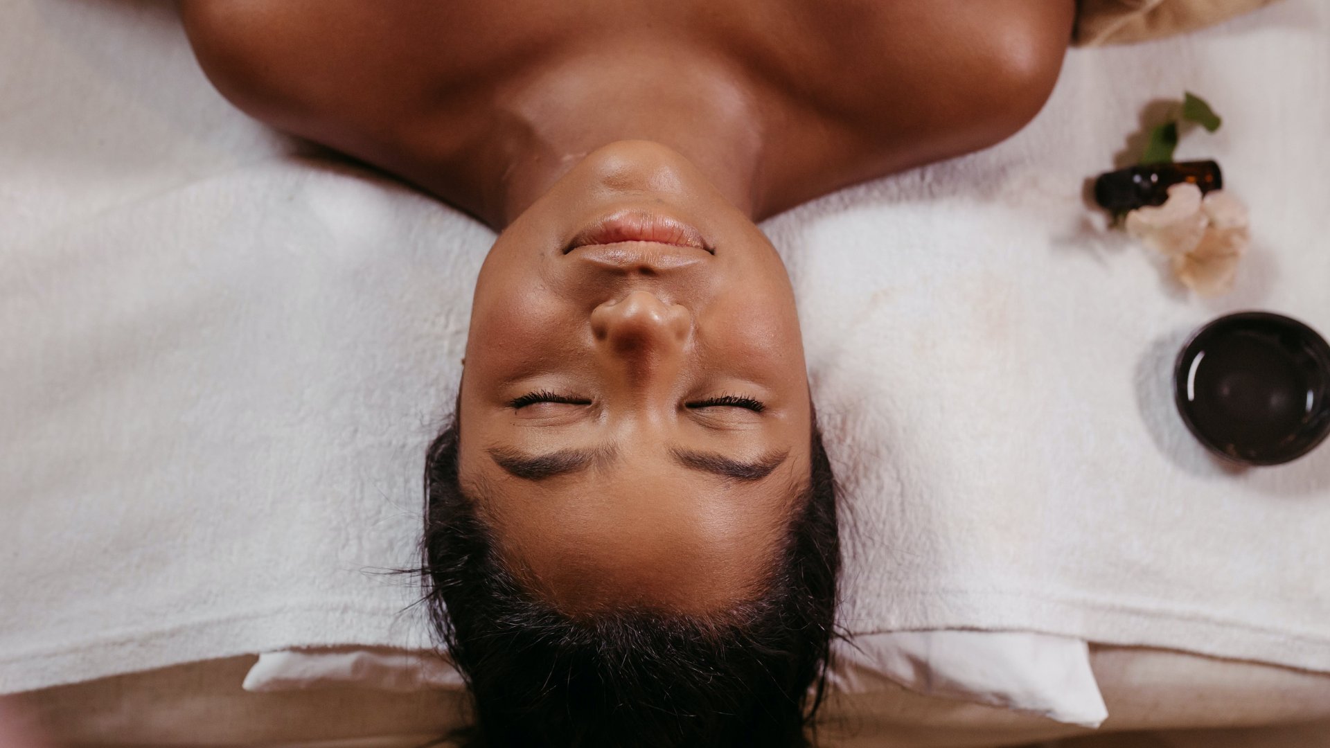 Woman relaxing during a deep tissue massage