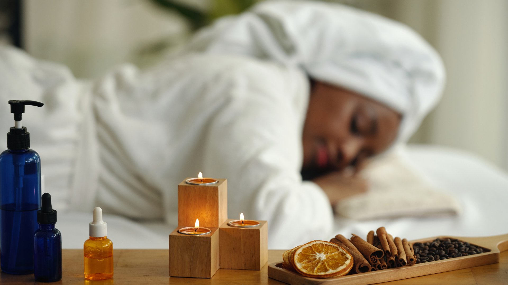 Thai oil massage with candles and botanical oils